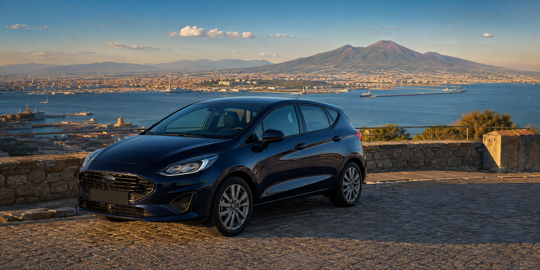 Automobile a noleggio con il Golfo di Napoli e il Vesuvio sullo sfondo
